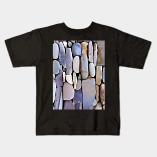 A pattern of many colored and oblong, square and round stones Kids T-Shirt